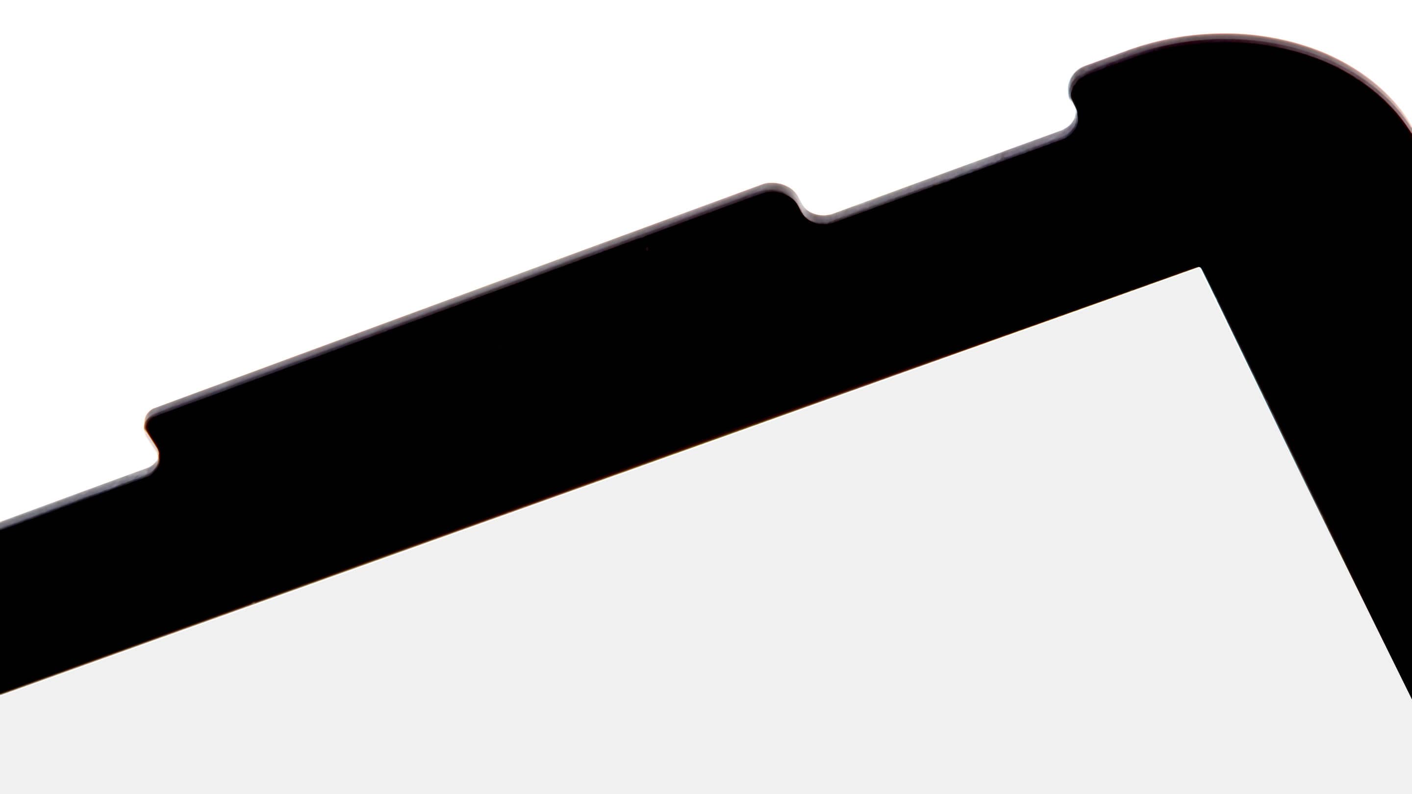 Impactinator® Glass - Glass behandlede perfekt en sort filmappe med en hvid baggrund