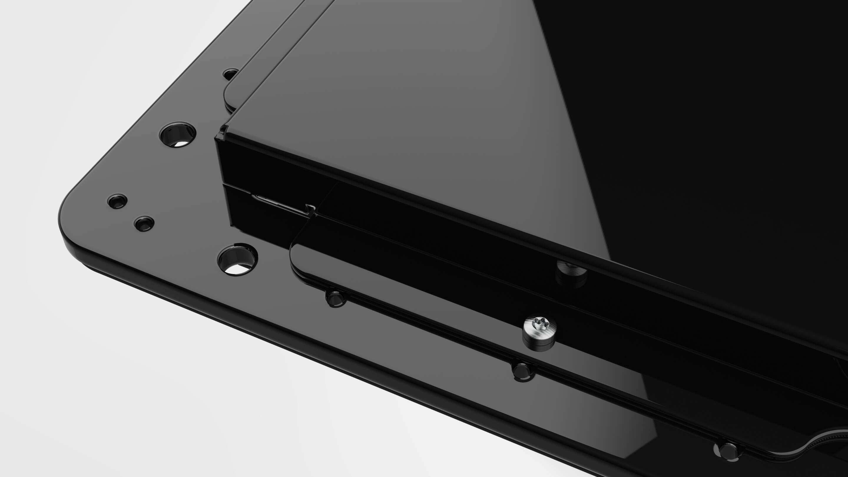 Ontwikkeling - Open Frame Case Black Detail een zwart rechthoekig object met schroeven
