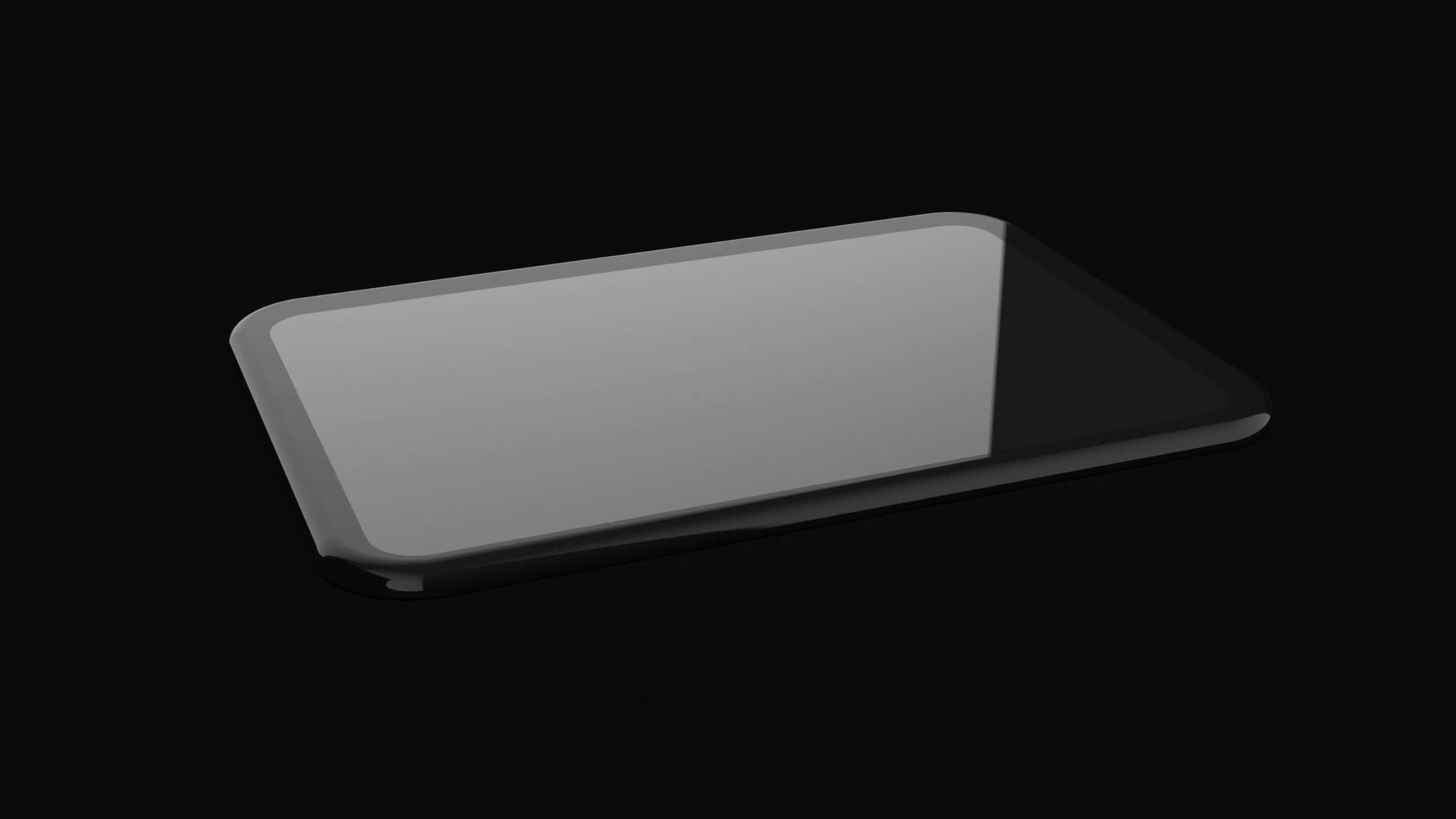 Impactinator® Glass - Glass Round Edge Rotation Black un objet rectangulaire noir avec un fond noir