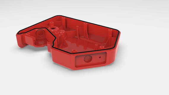 Производство - Fip Seals красный пластиковый объект с черными линиями